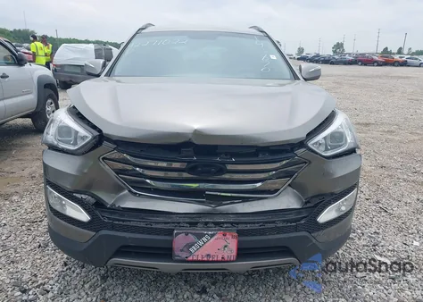 2014 Hyundai Santa Fe Sport 2.4L z USA, uszkodzony, nr VIN 5XYZU3LB4EG143870